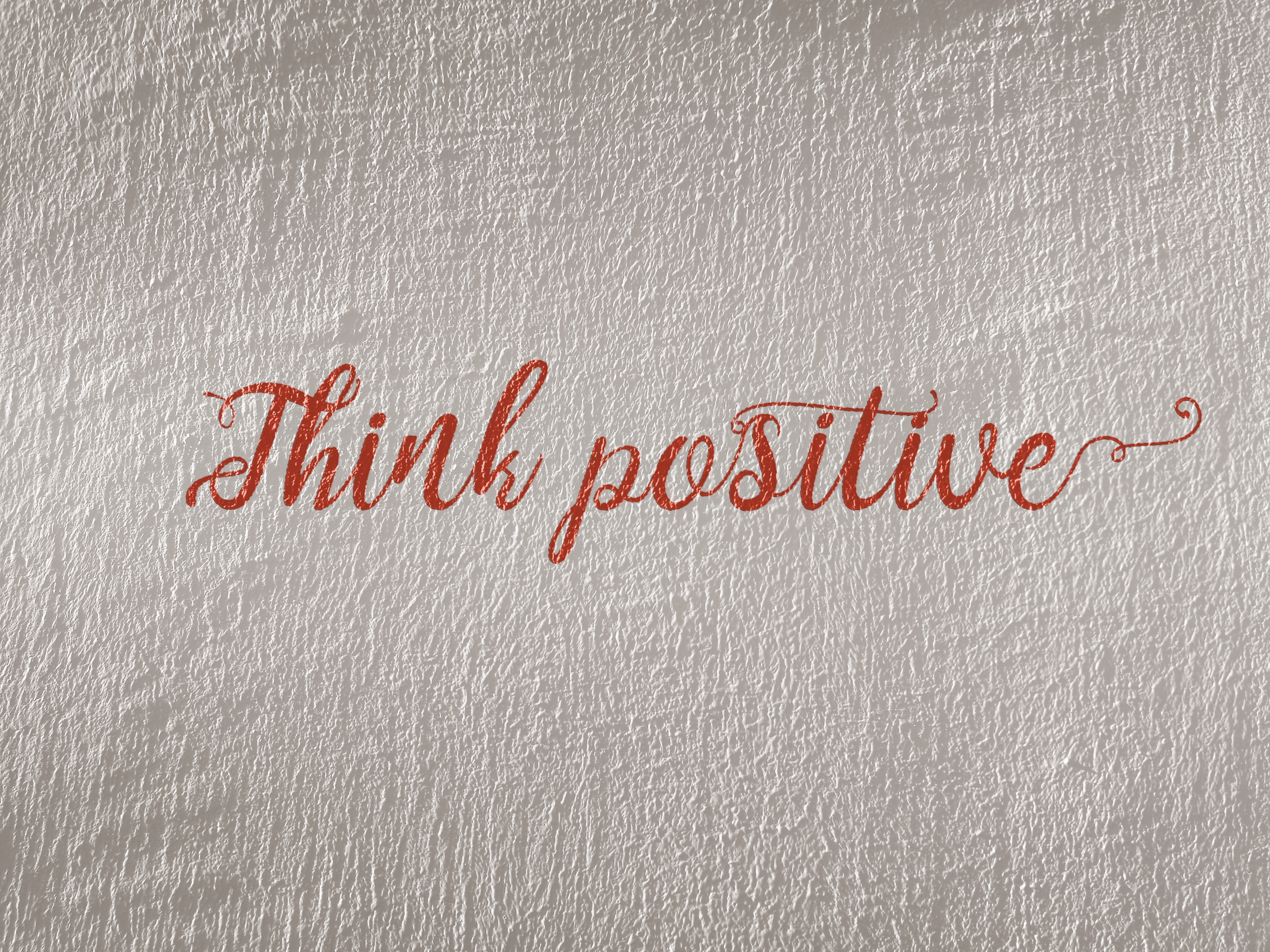 PRT Staffing Work Culture Promoting Positivity Think Positive Script on White Wall